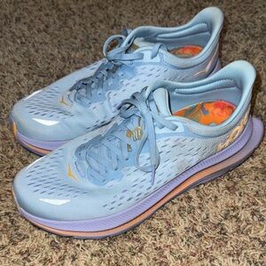 Hoka Women's Kawana 8.5B running shoes
Light Blue orange purple